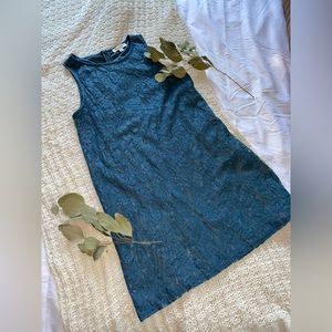 Francesca’s teal lace cocktail dress